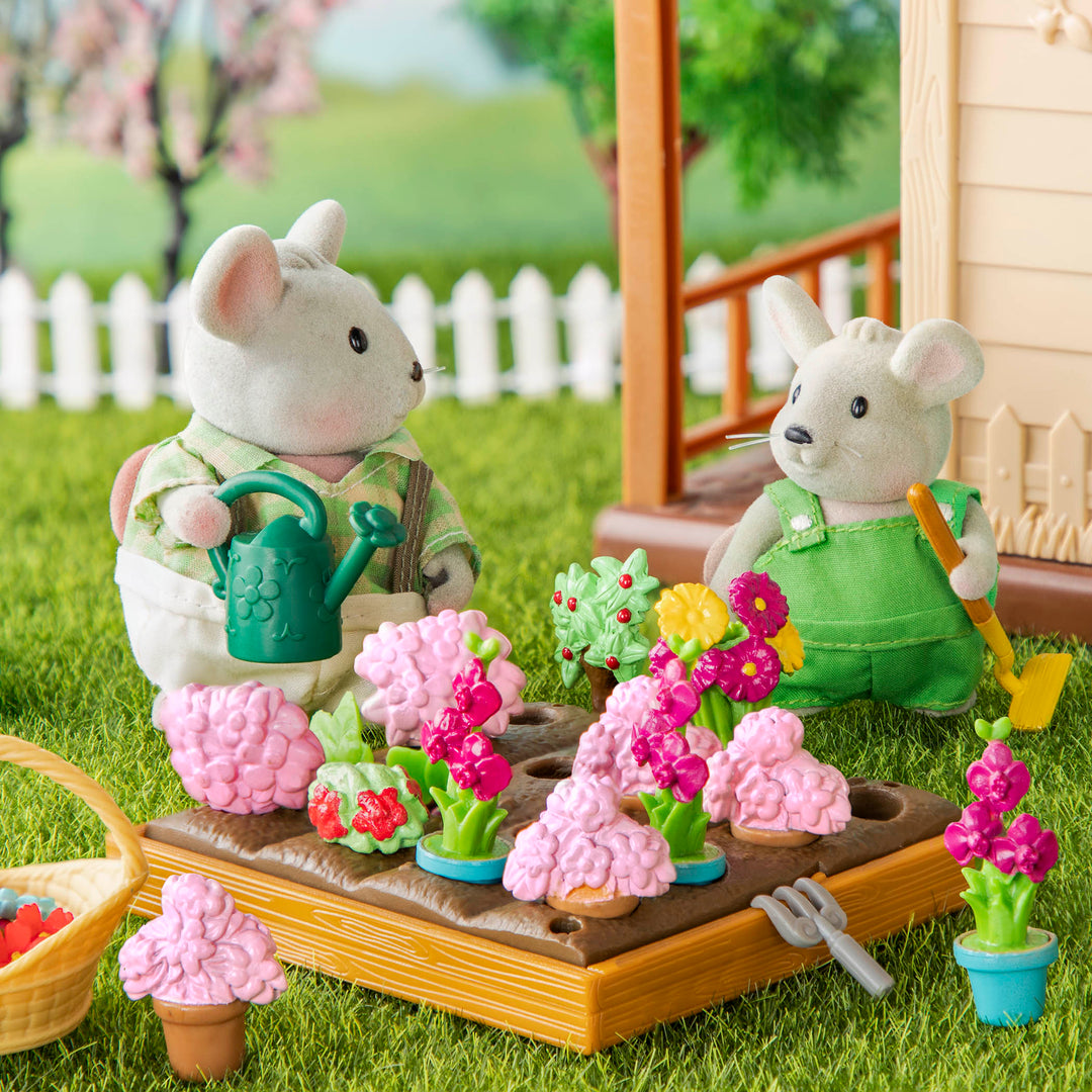 Sheep figurine with gardening playset
