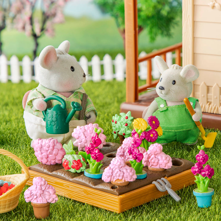 Sheep figurine with gardening playset