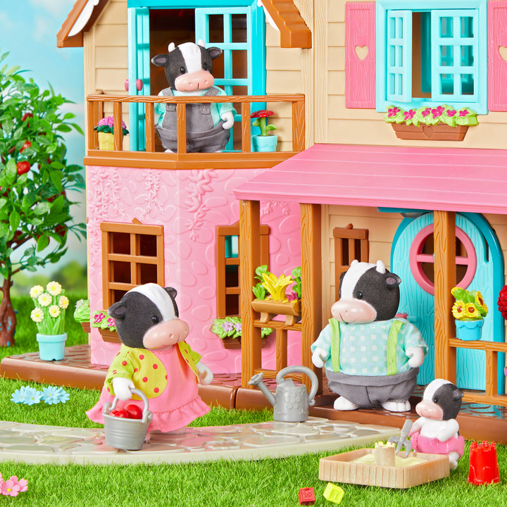 Miniature cow figurine set with storybook